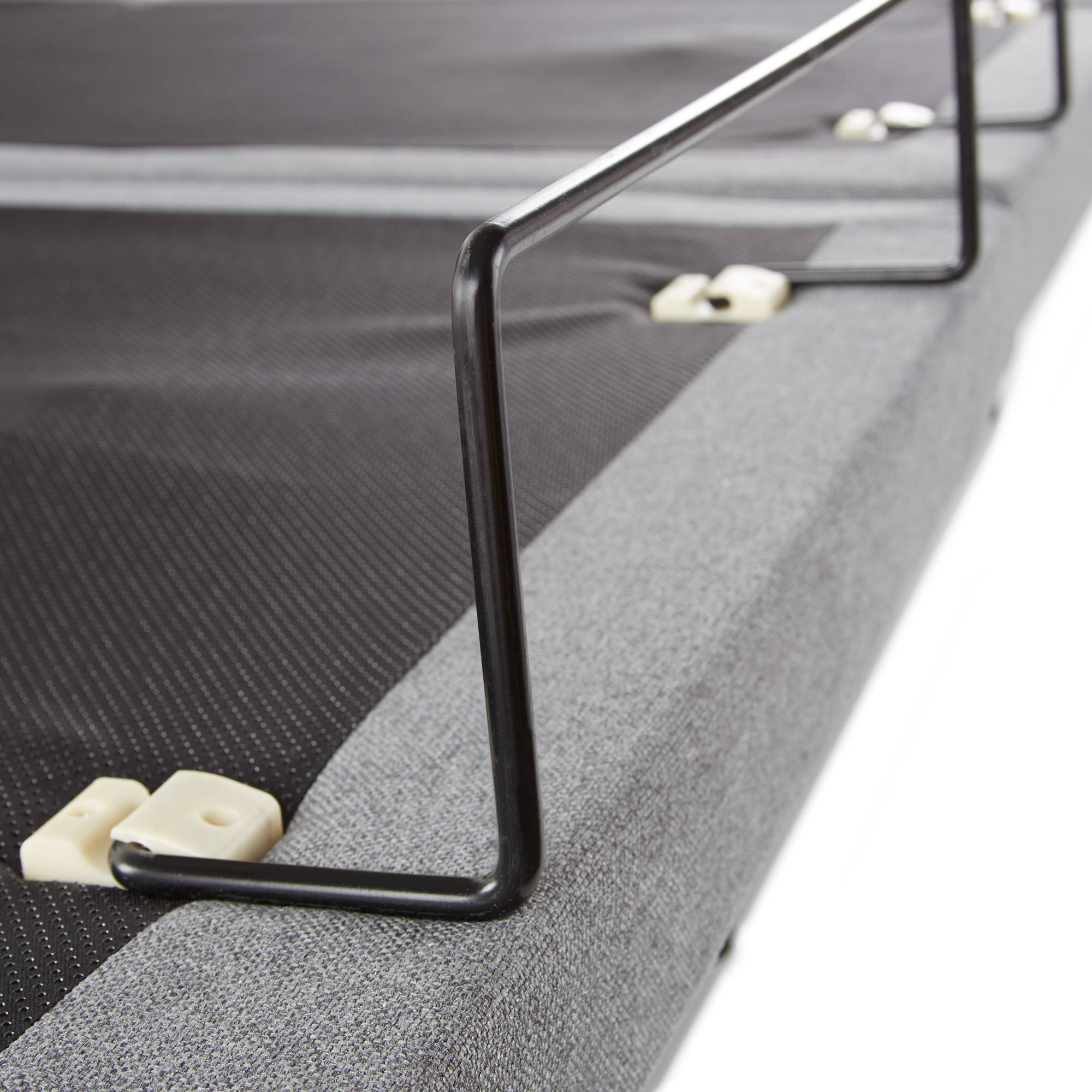 Retainer bar at the end of the adjustable base helps to keep your mattress in place.