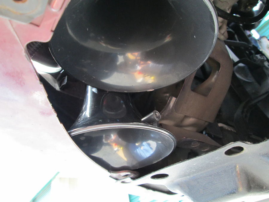 Two black trumpet horns mounted behind front bumper fascia Frank's Toyota Yaris Shocker XL train horn gallery photo 4