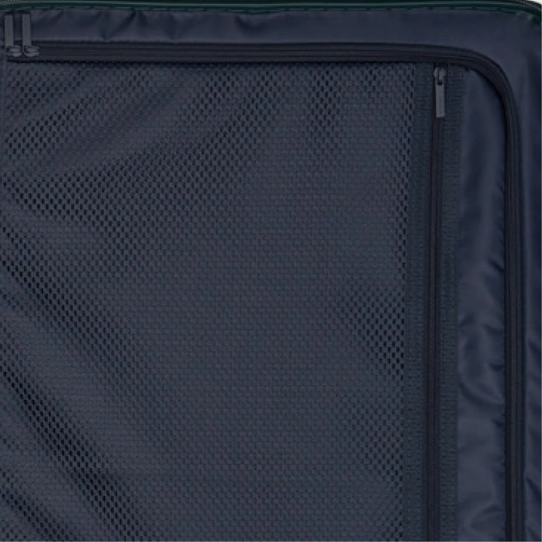 Close-up of a dark fabric with mesh texture and zipper.