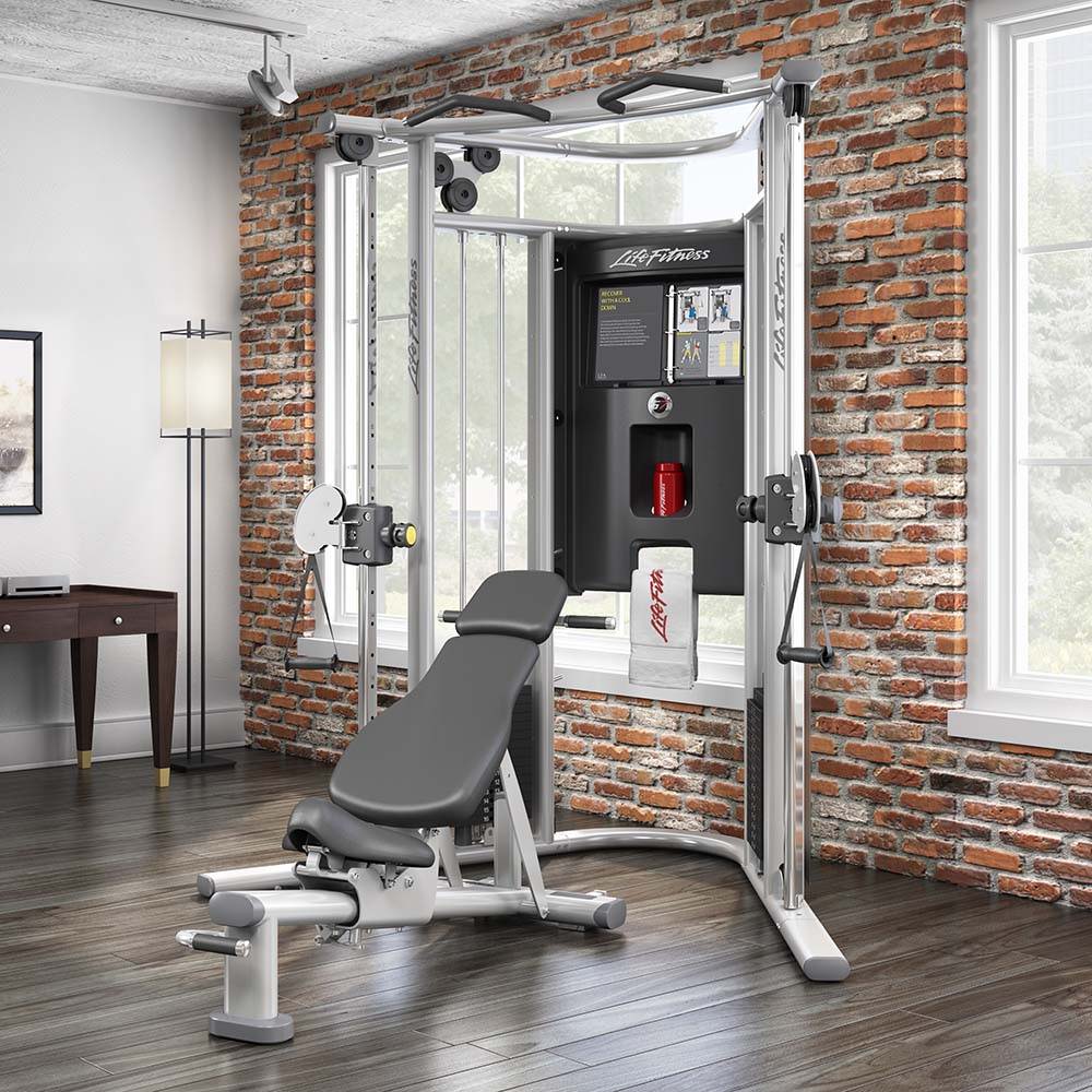 G7 Home Gym functional trainer and G7 Bench in home with brick walls