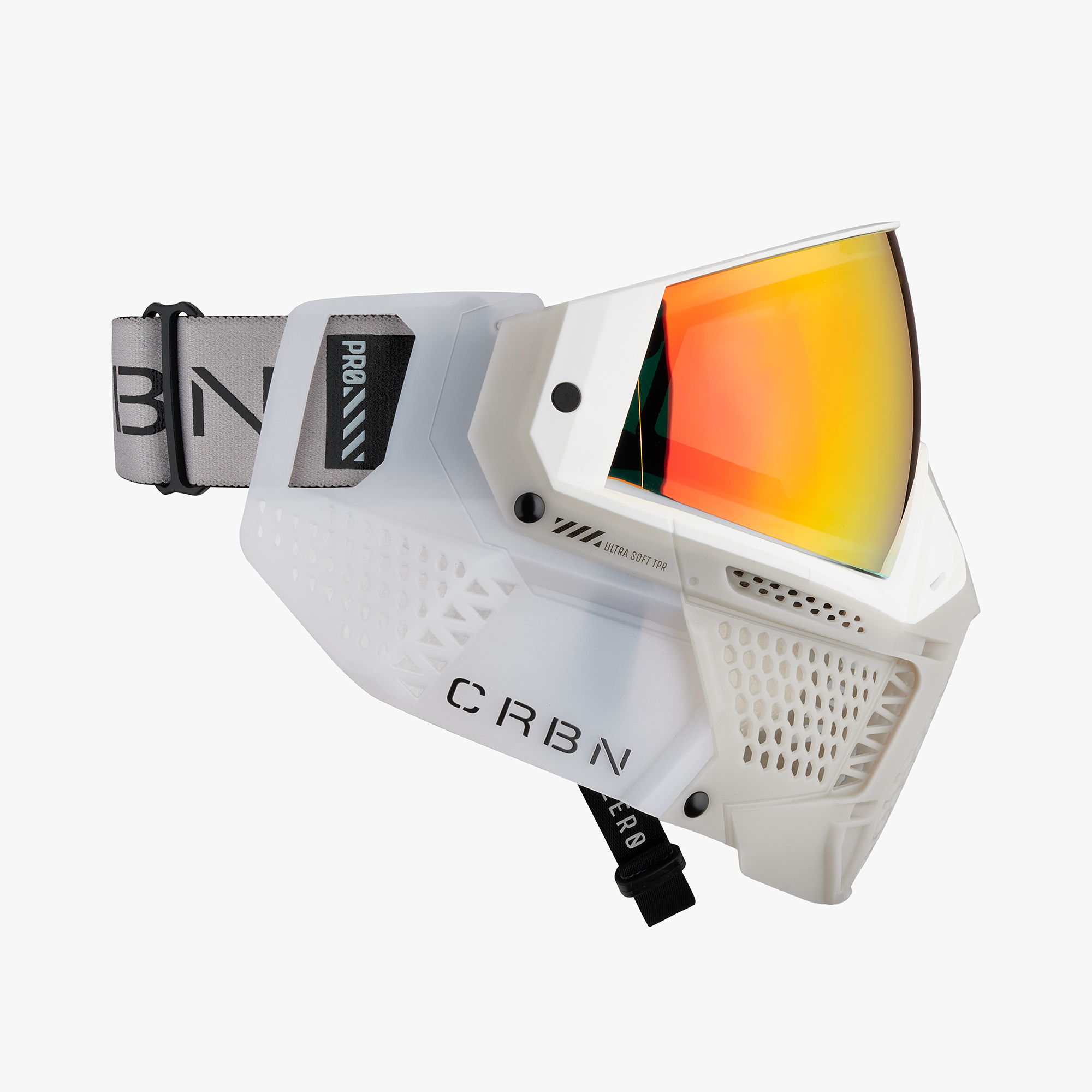 Paintball goggle with a white frame and orange-tinted lens.