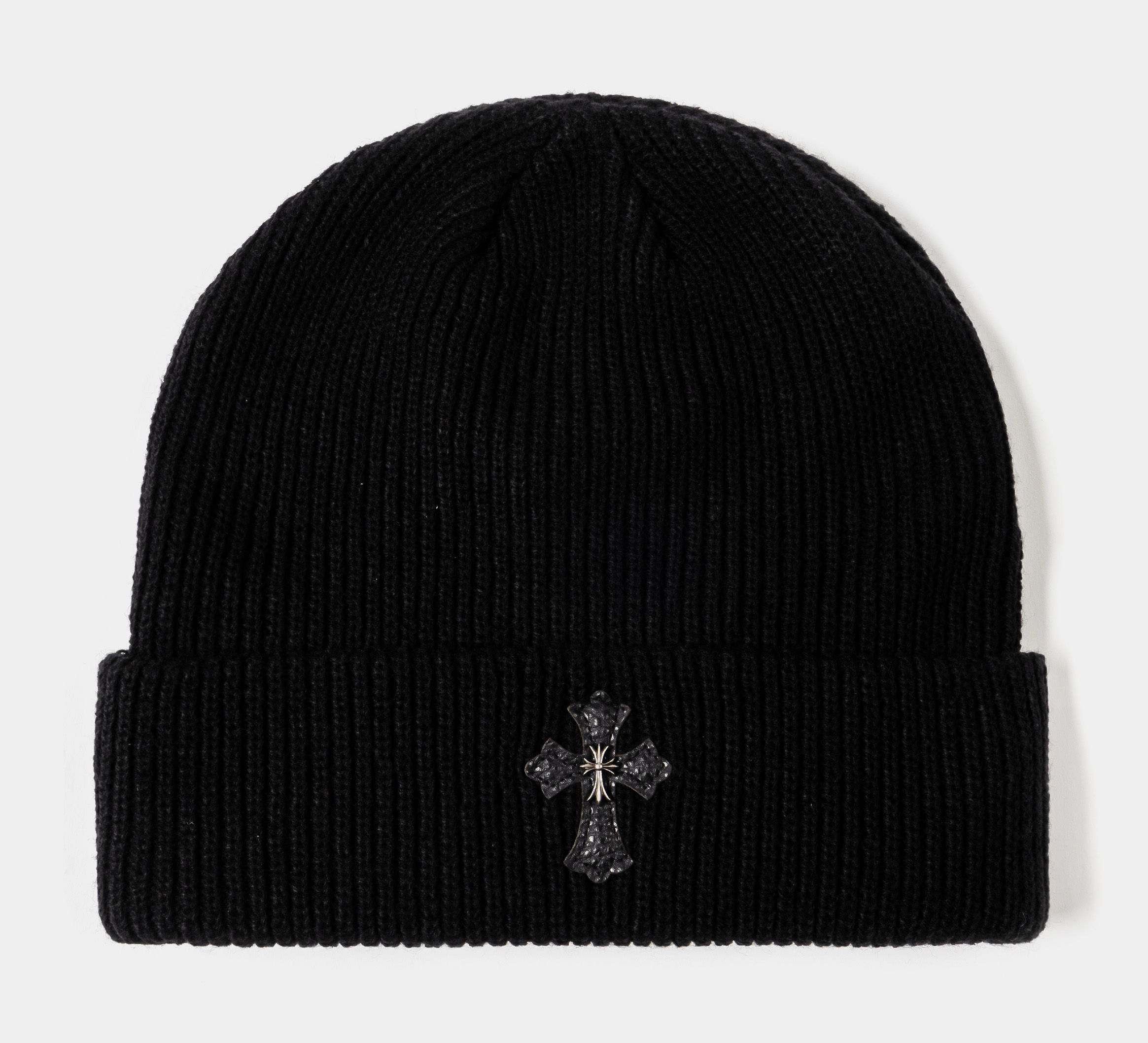 Black knit beanie with a decorative cross emblem.
