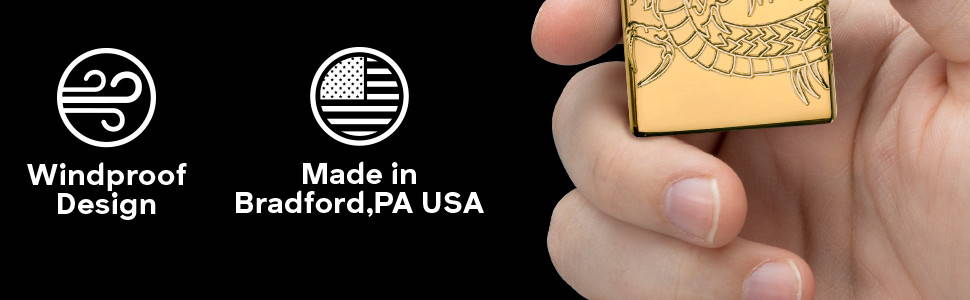 Dragon lighter lit in hand with Windproof Design and Made in Bradford, PA USA icons
