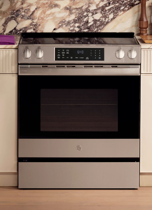 Modern stainless steel oven with digital controls and glass door.