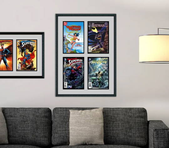 A living room with framed comic books.