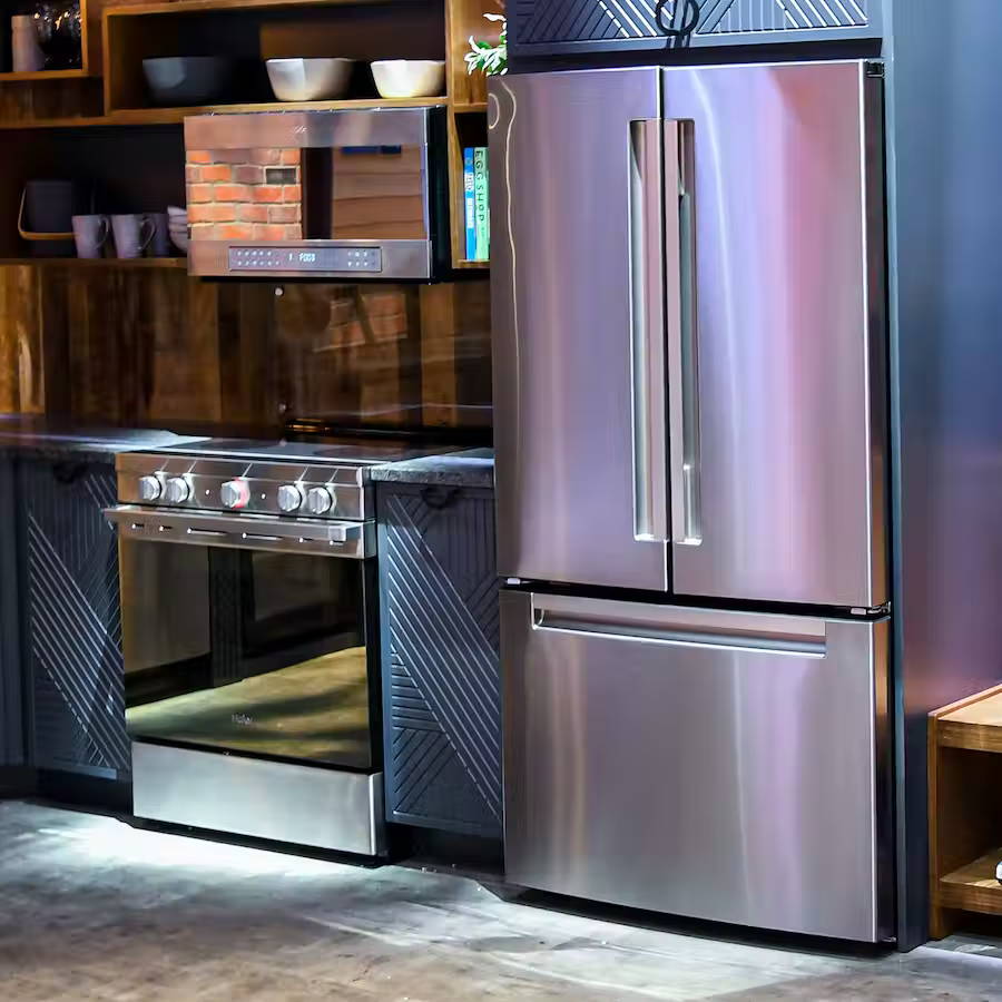 Haier full size appliances built into a modern loft kitchen