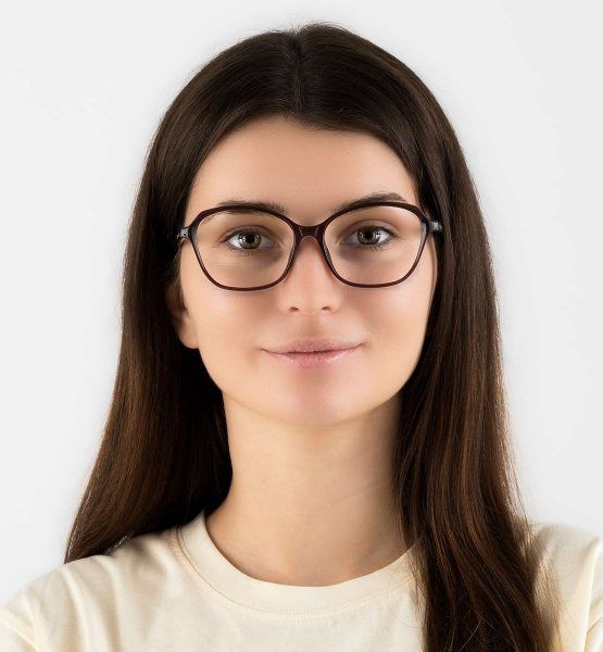 woman wearing Glee Red, cat-eye glasses for diamond face shape, on a white background