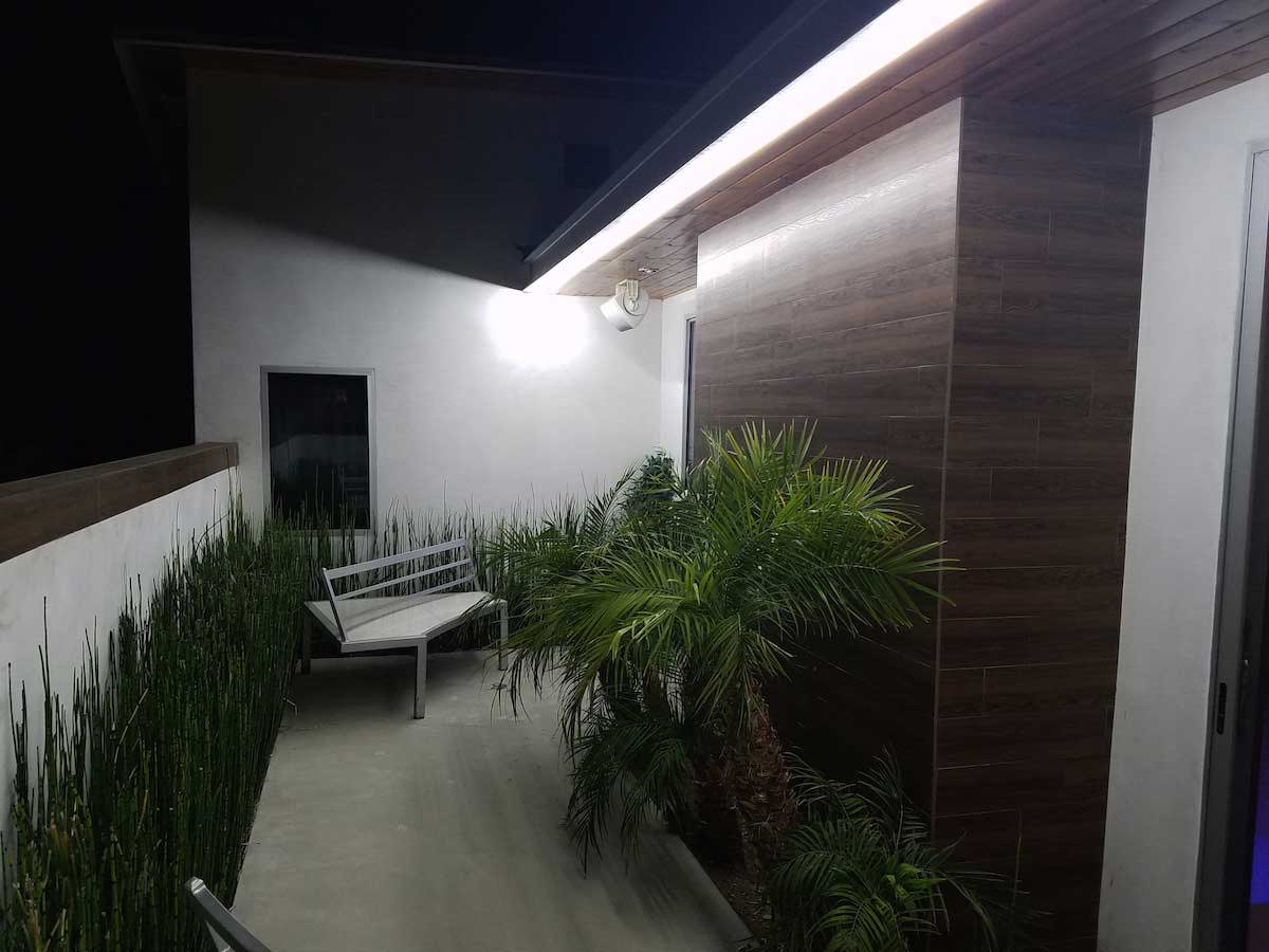 Outdoor soffit lighting with linear LED strip lights
