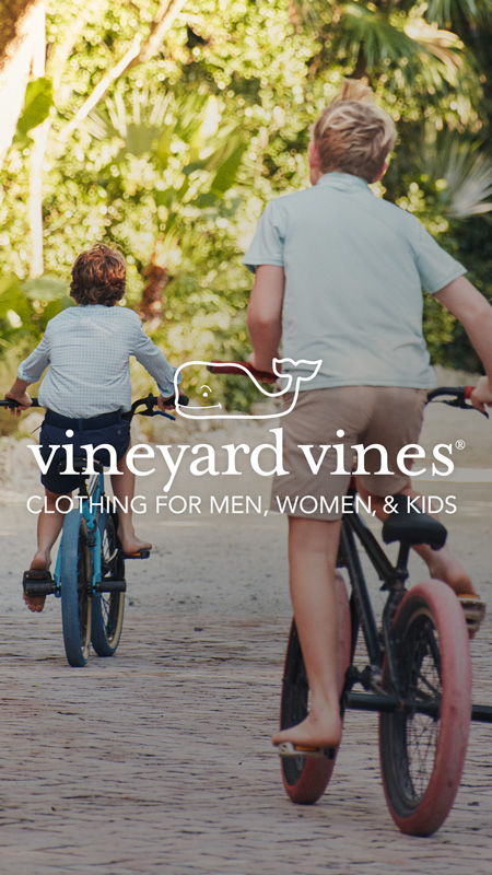 Two children riding bicycles outdoors, with a logo and brand message.