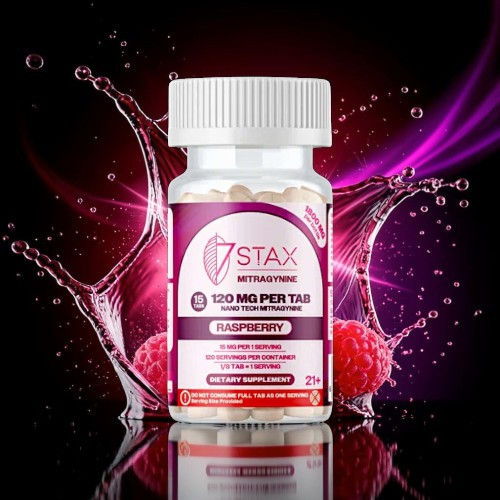 Bottle of dietary supplement with raspberry background and water splashes.
