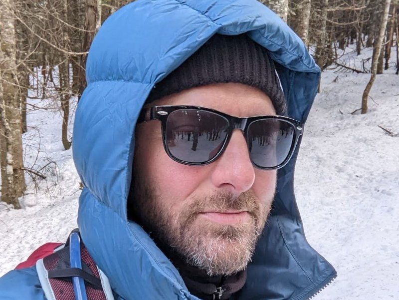 man wearing Challenger sunglasses with polarized lenses on snow