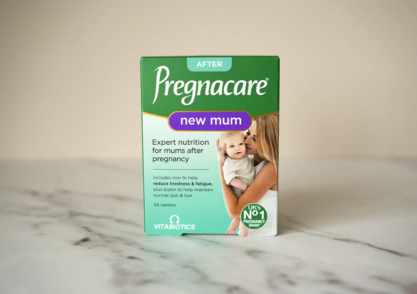 Pregnacare New Mum supplement box on a marble surface.