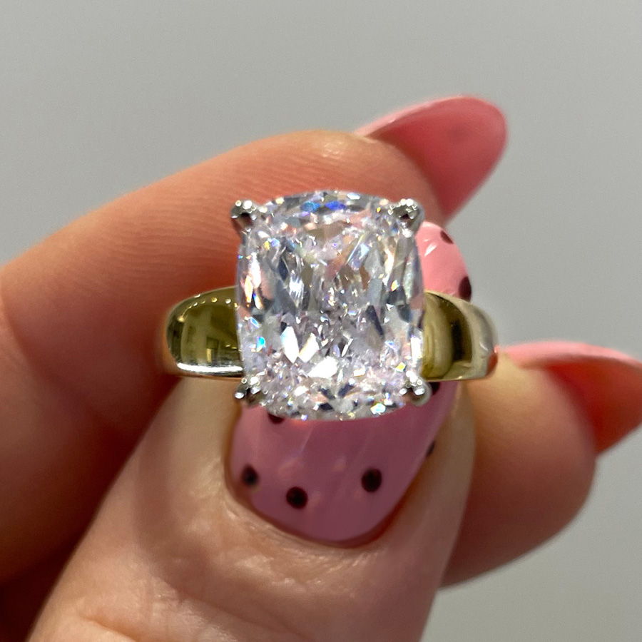 Custom engagement ring with large cushion cut diamond