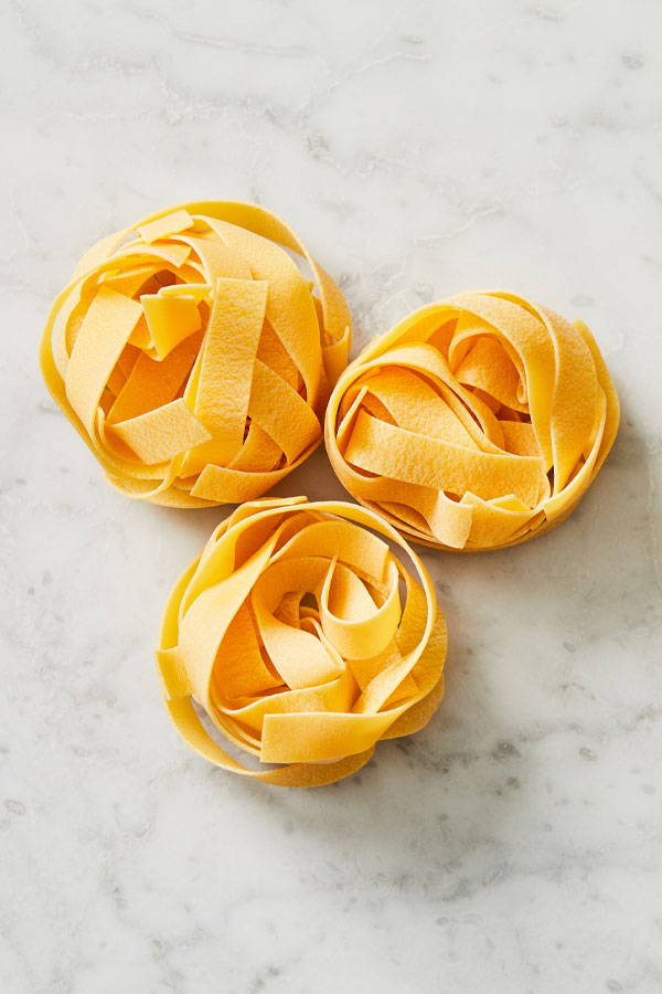 Close-up view of Pappardelle pasta nests