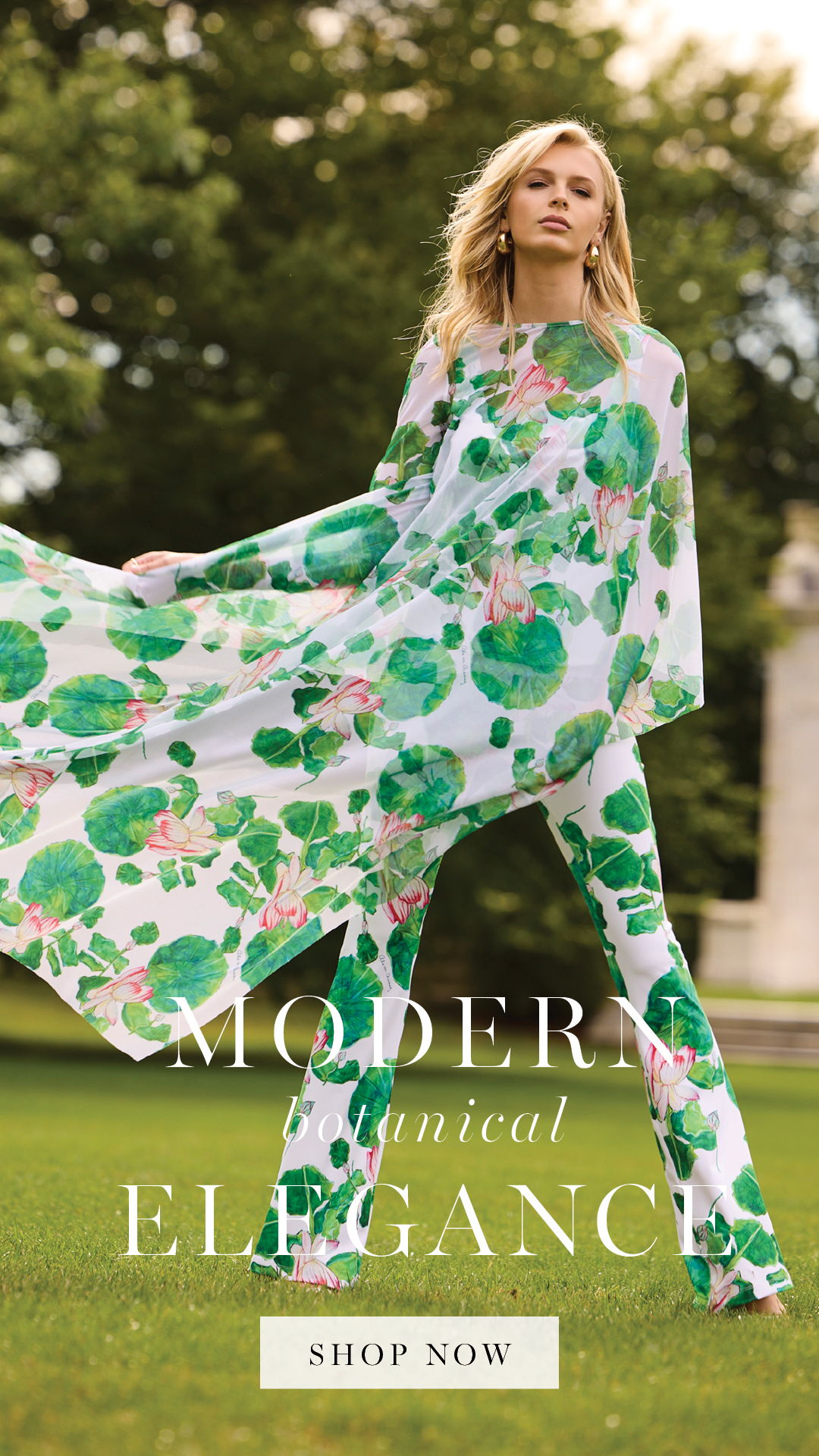 Model wearing floral outfit in a garden, promoting modern elegance fashion.