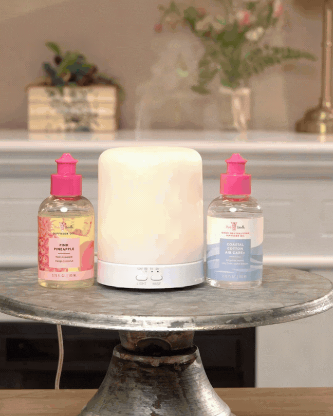 Mini ultrasonic diffuser with Coastal Cotton and Pink Pineapple diffuser oils