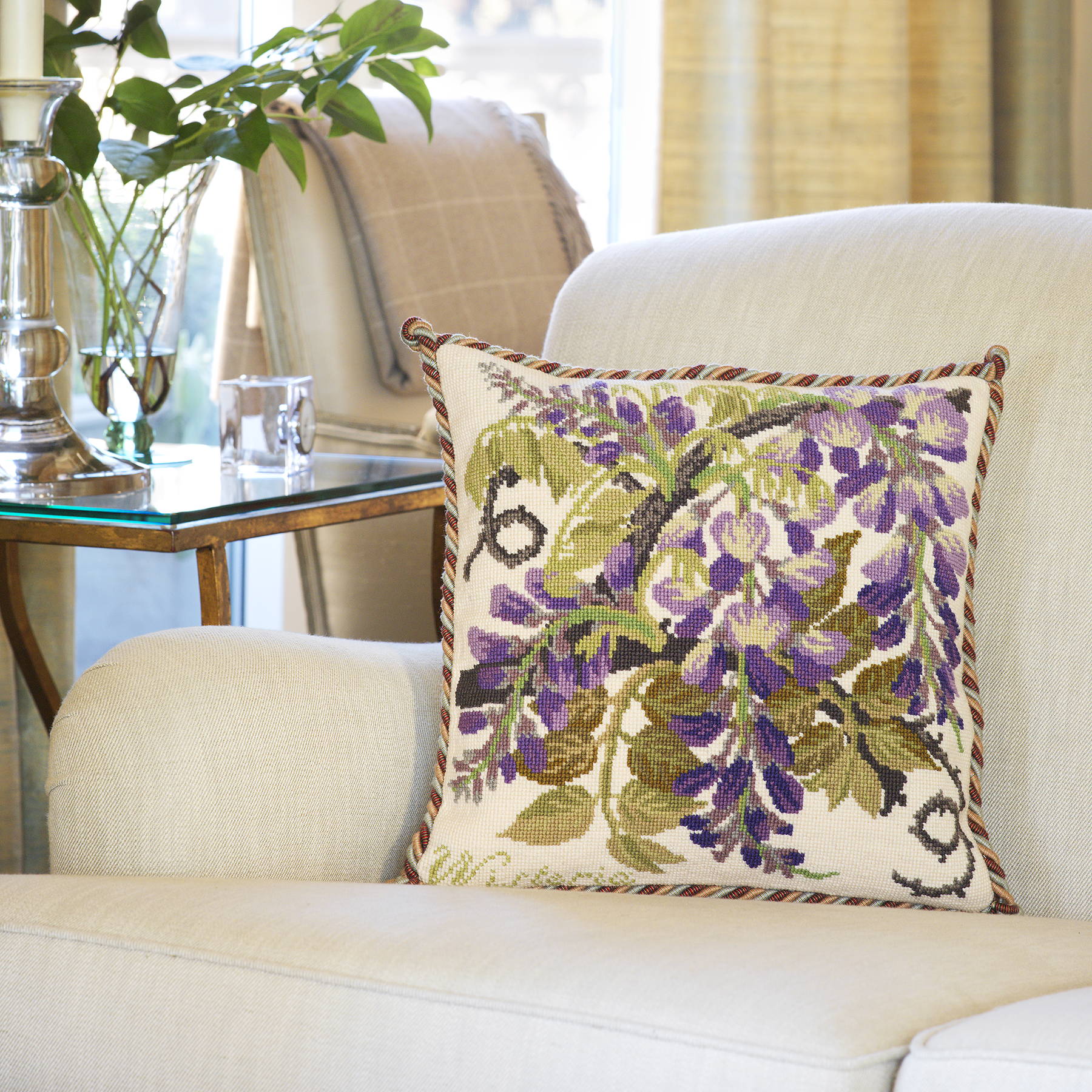 Wisteria finished cushion on cream chair