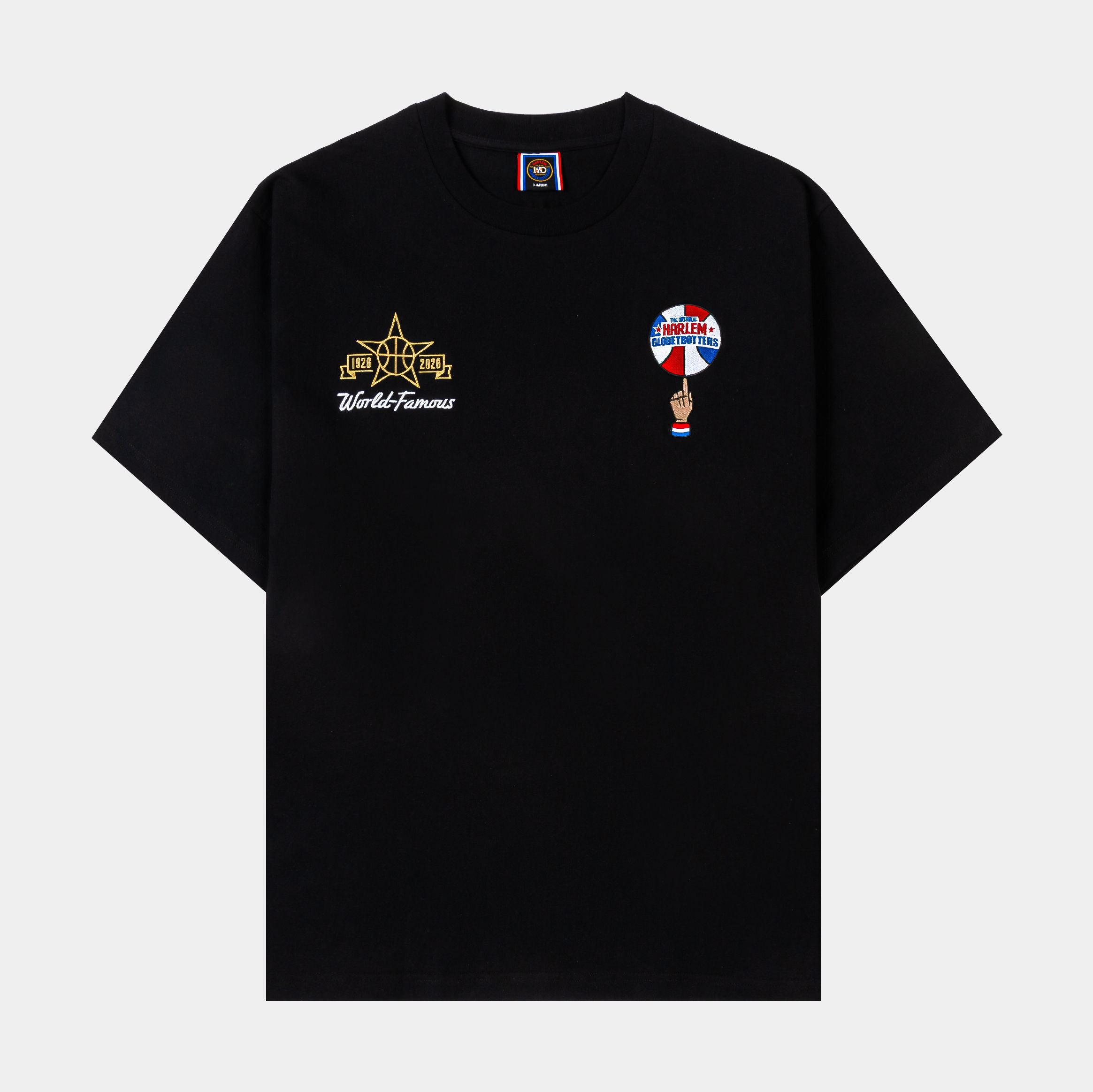 Black t-shirt featuring embroidered designs on the front.