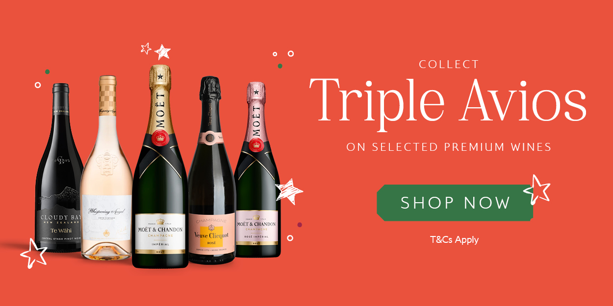 Bottles of champagne with a promotional message for Triple Avios rewards.
