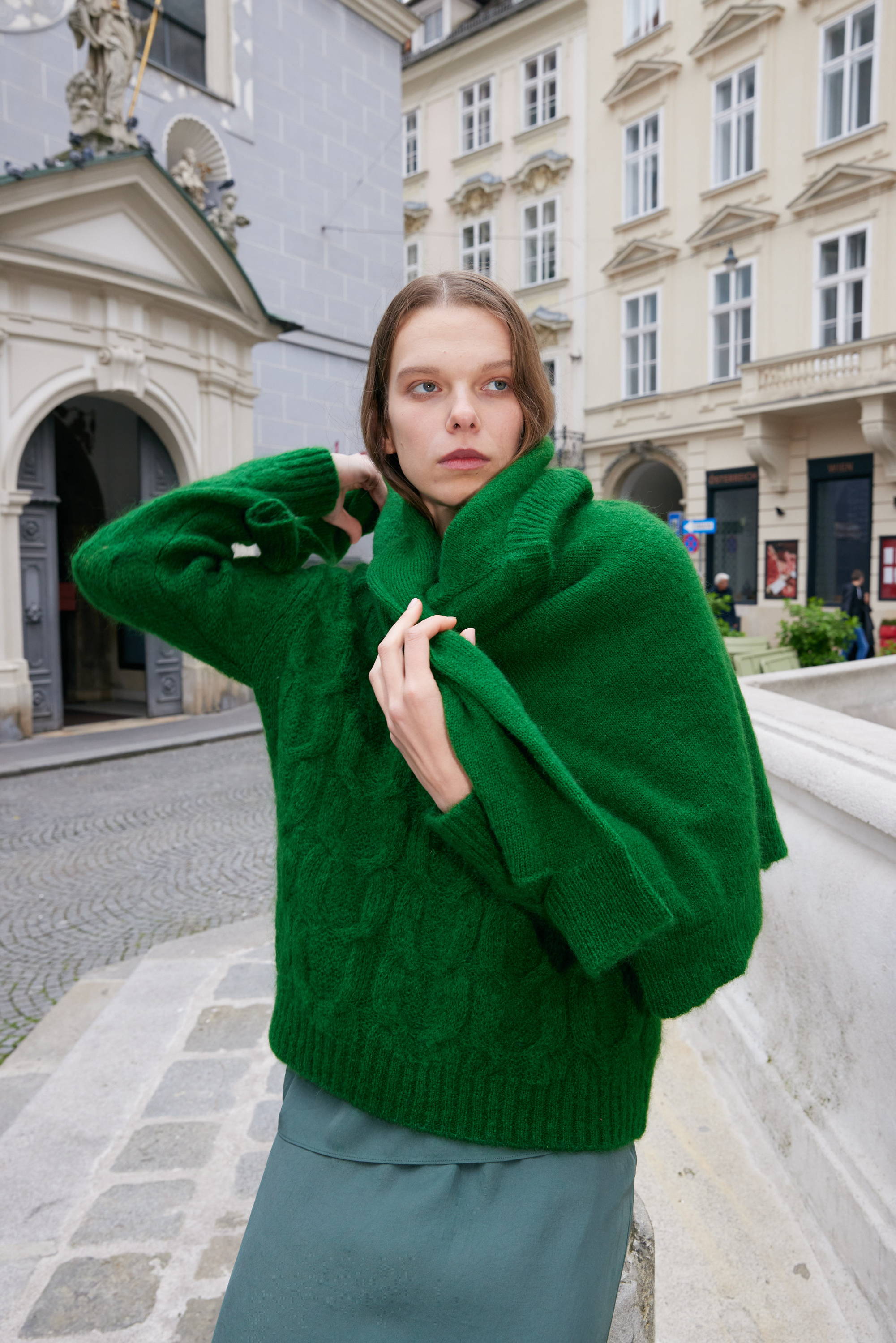 model wearing sweater on the street