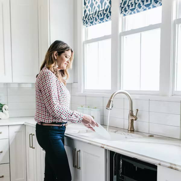 Gretchen Black rinsing dish