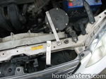 Circular horn device radiator support strap Kinetik battery engine bay 2001 Toyota Corolla Nathan AirChime K5LA gallery photo 15