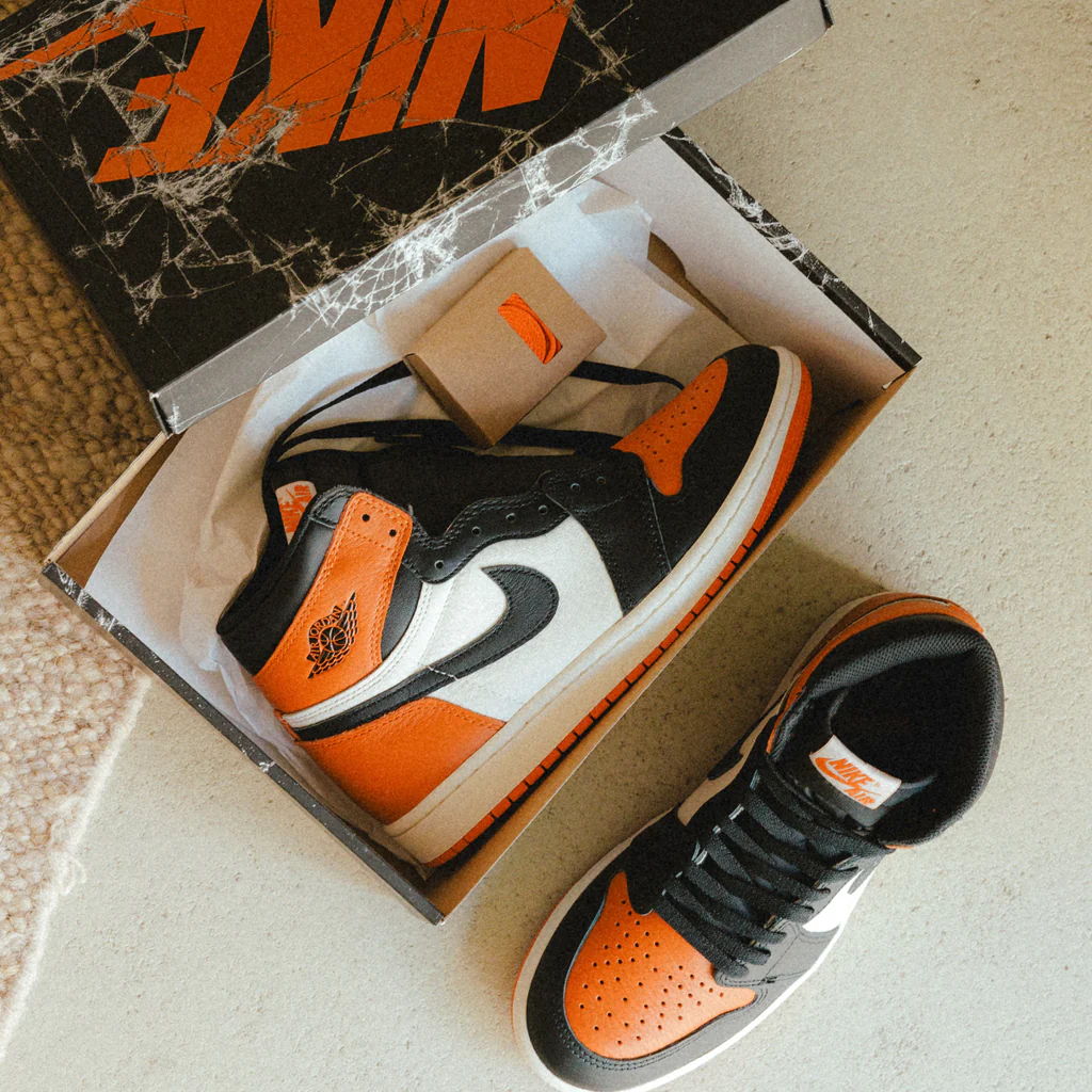 A pair of Nike shoes in an open box.
