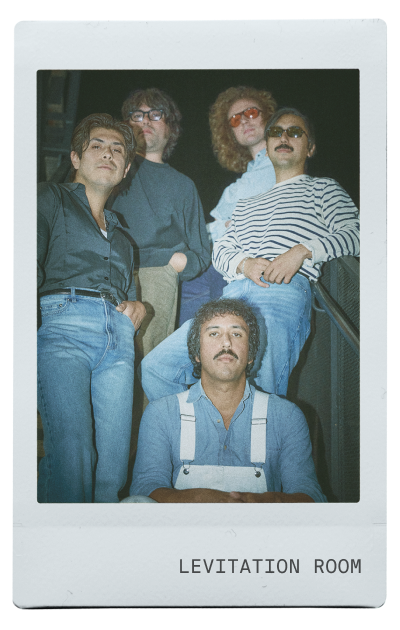 Five men posing together in a retro-style photo.