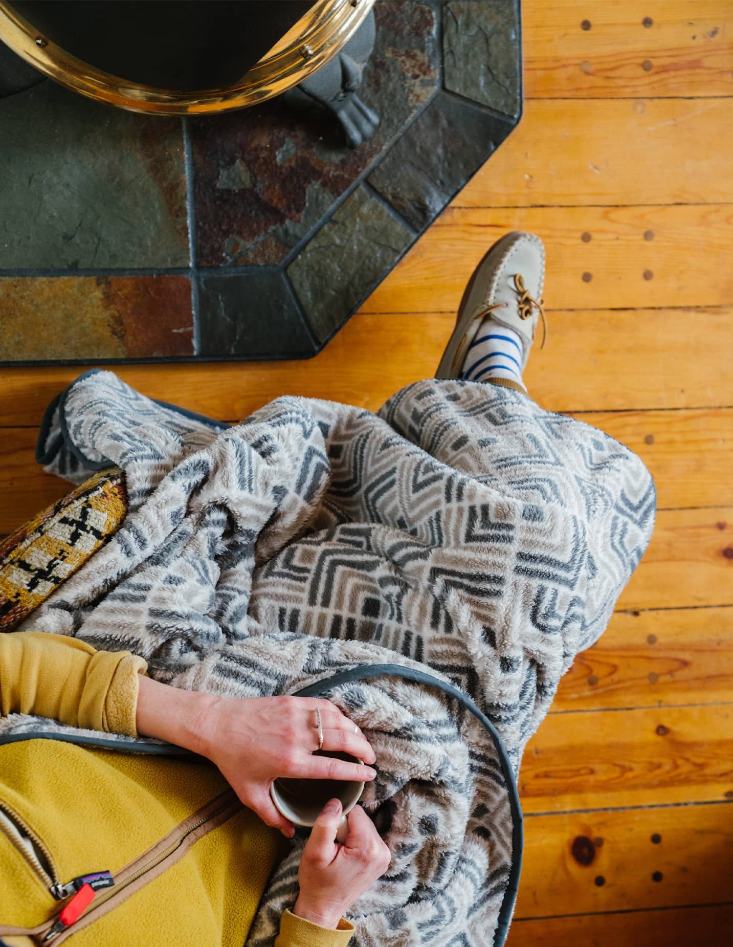 Woman wrapped in Sherpa Fleece Blanket