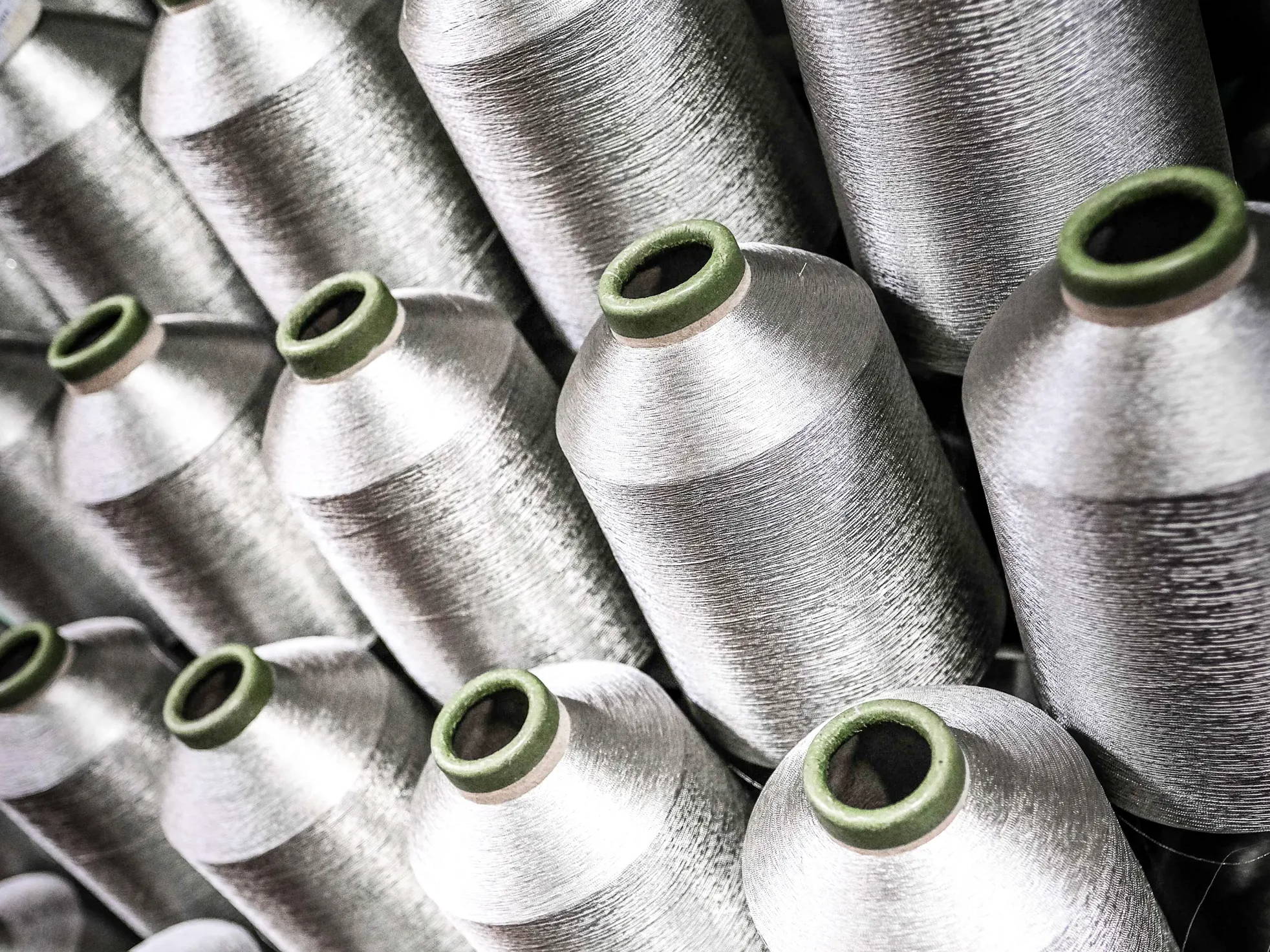 A picture of rolls of silver thread
