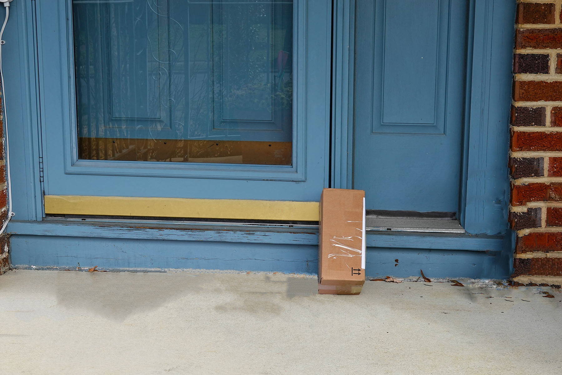 Package at front door of house
