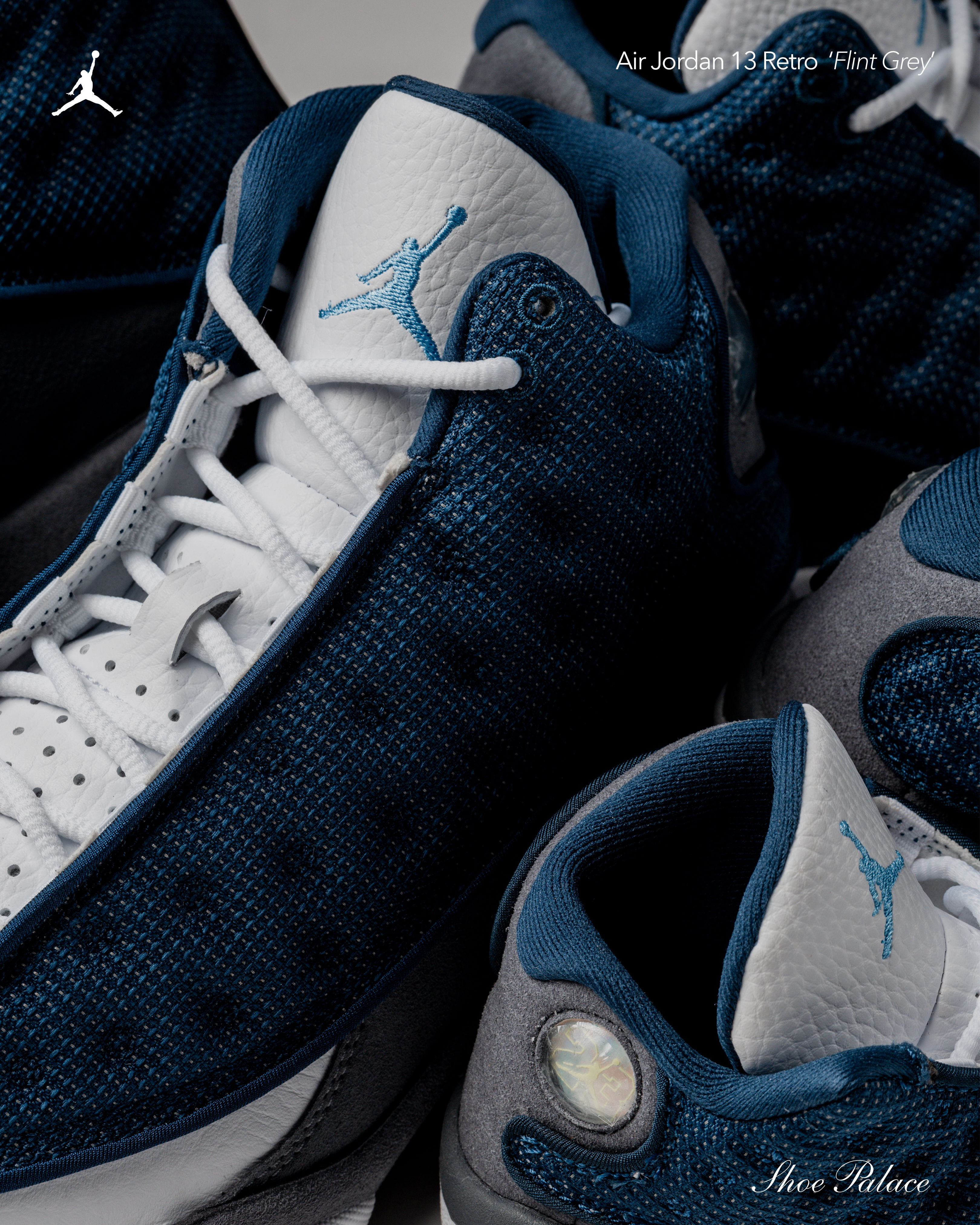 Close-up of Jordan sneakers in navy blue and gray colors.