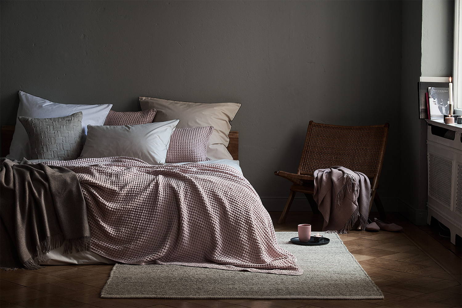 Cosy bedroom with pillows and bedspread