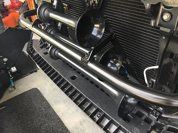 Triple black Shocker XL air horns custom bracket behind grille radiator tubular bumper bar install Kristin's 2016 Subaru WRX gallery photo 4