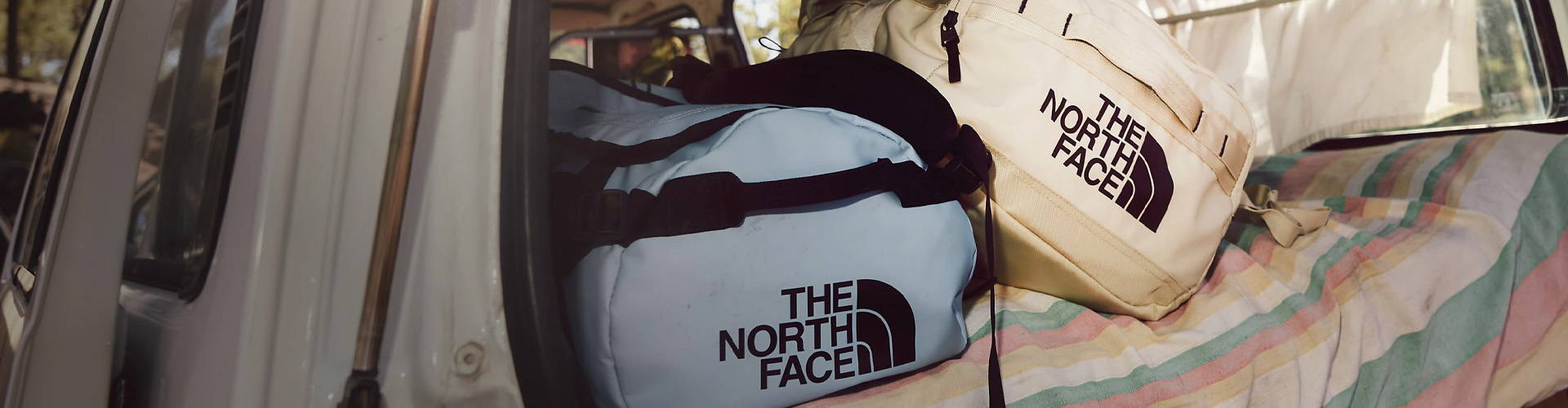 Duffel Bags from The North Face in a camper van.