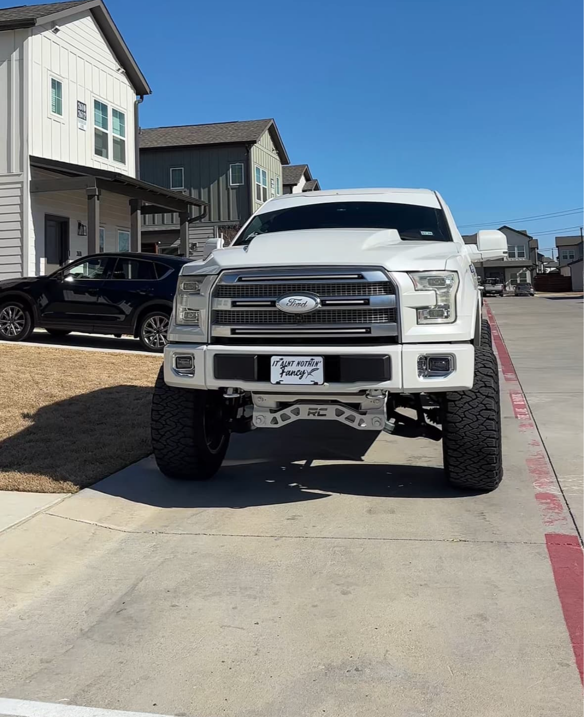 2015 Ford Expedition Platinum with HornBlasters Spare Tire Delete Kit and Shocker XL 6 horn upgrade in the factory spare tire well