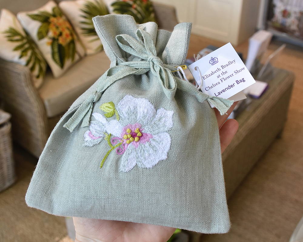 Lavender bag with embroidered flower
