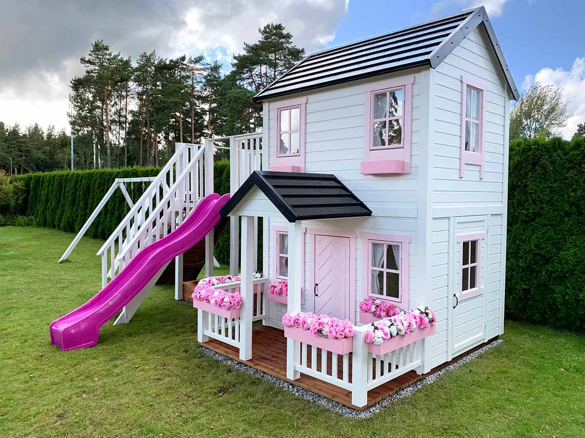 2- storey Custom Wooden Playhouse with pink slide, wooden terrace and flower boxes by WholeWoodPlayhouses
