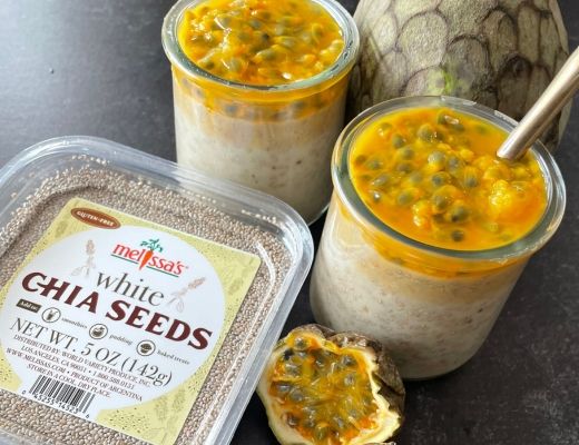 Chia seed pudding topped with passion fruit, with packaging nearby.