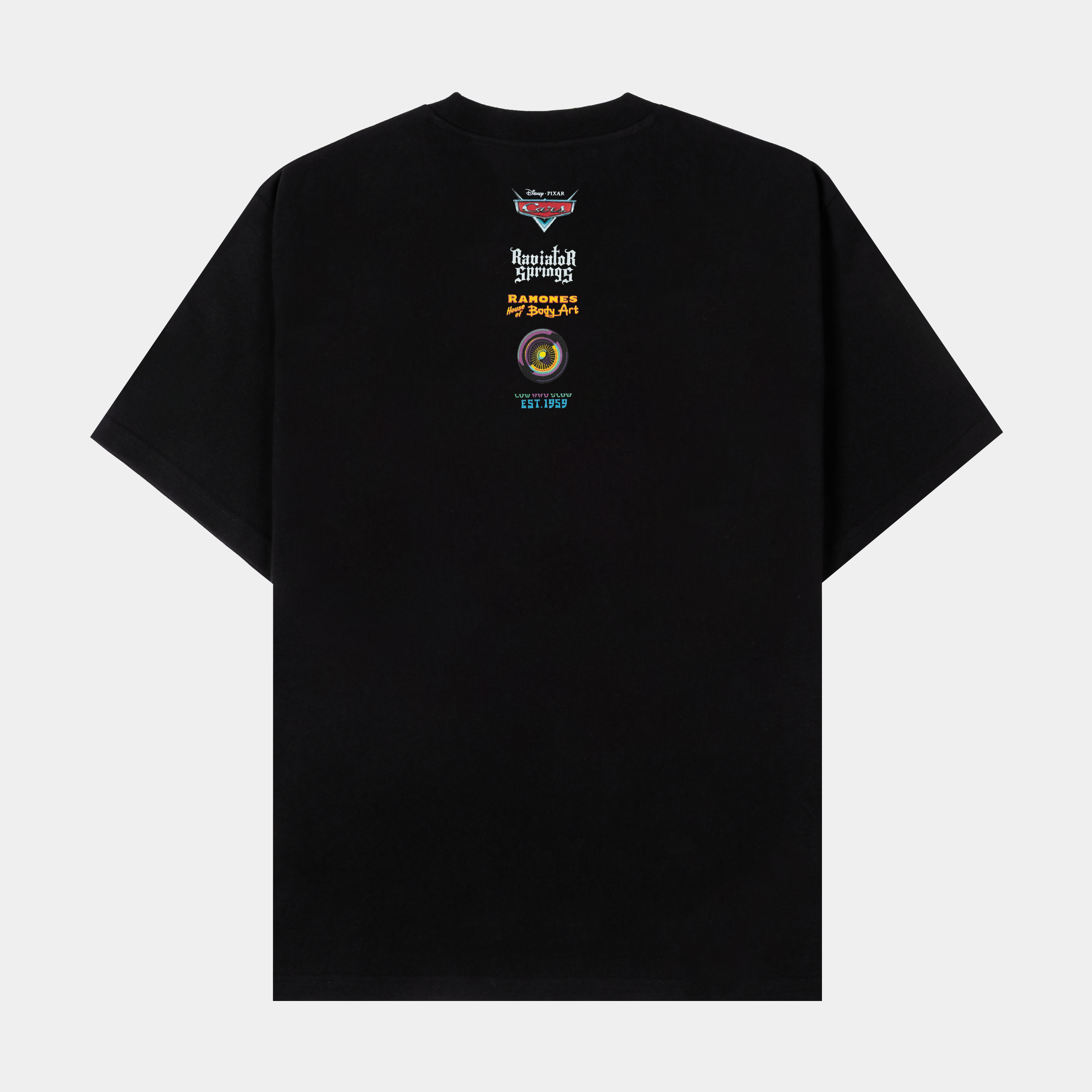 Black t-shirt featuring a colorful car graphic and playful text.