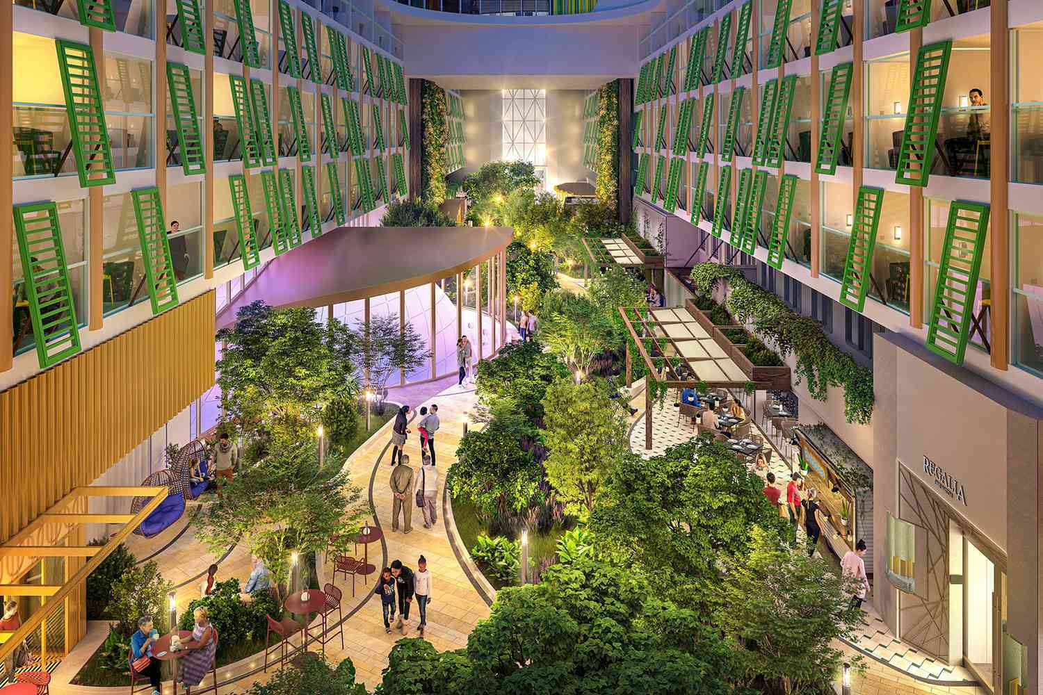 Indoor garden atrium with people, greenery, and balconies in a hotel setting.