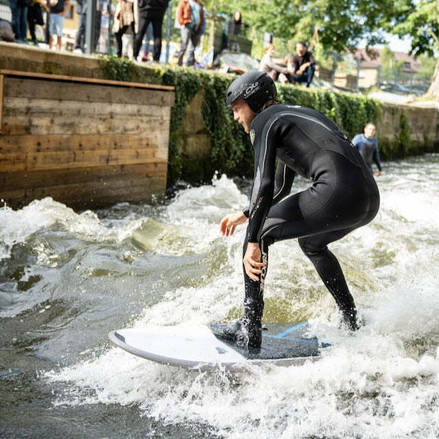 Person surfing KANOA foamie Surfboard