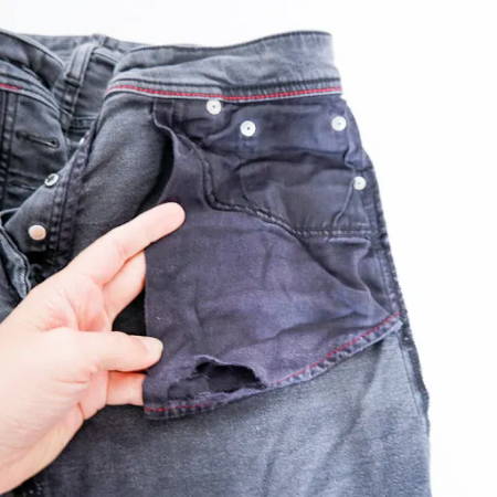 big hole in jeans pocket