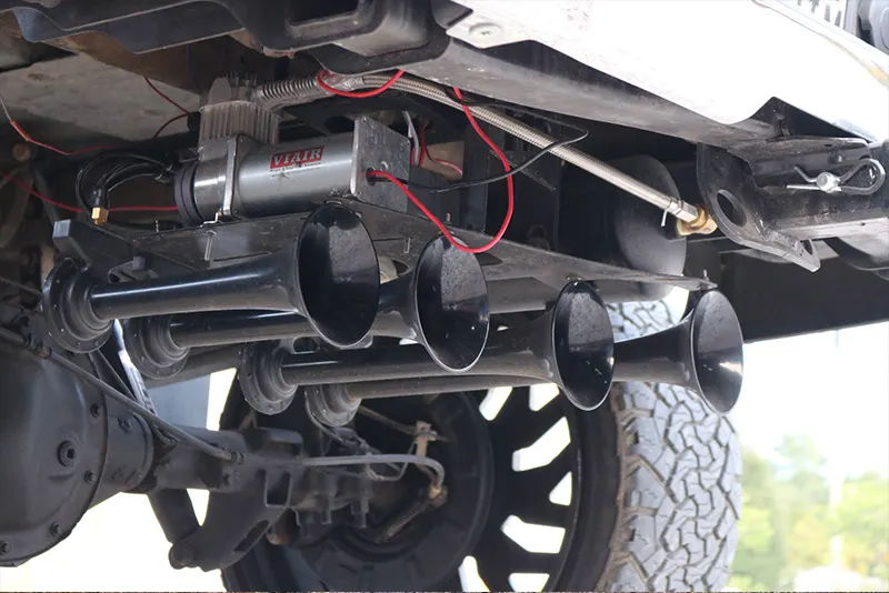 Under-bed or spare tire well Conductor's Special train horn and air system detail on GMC Sierra HornBlasters gallery photo 3