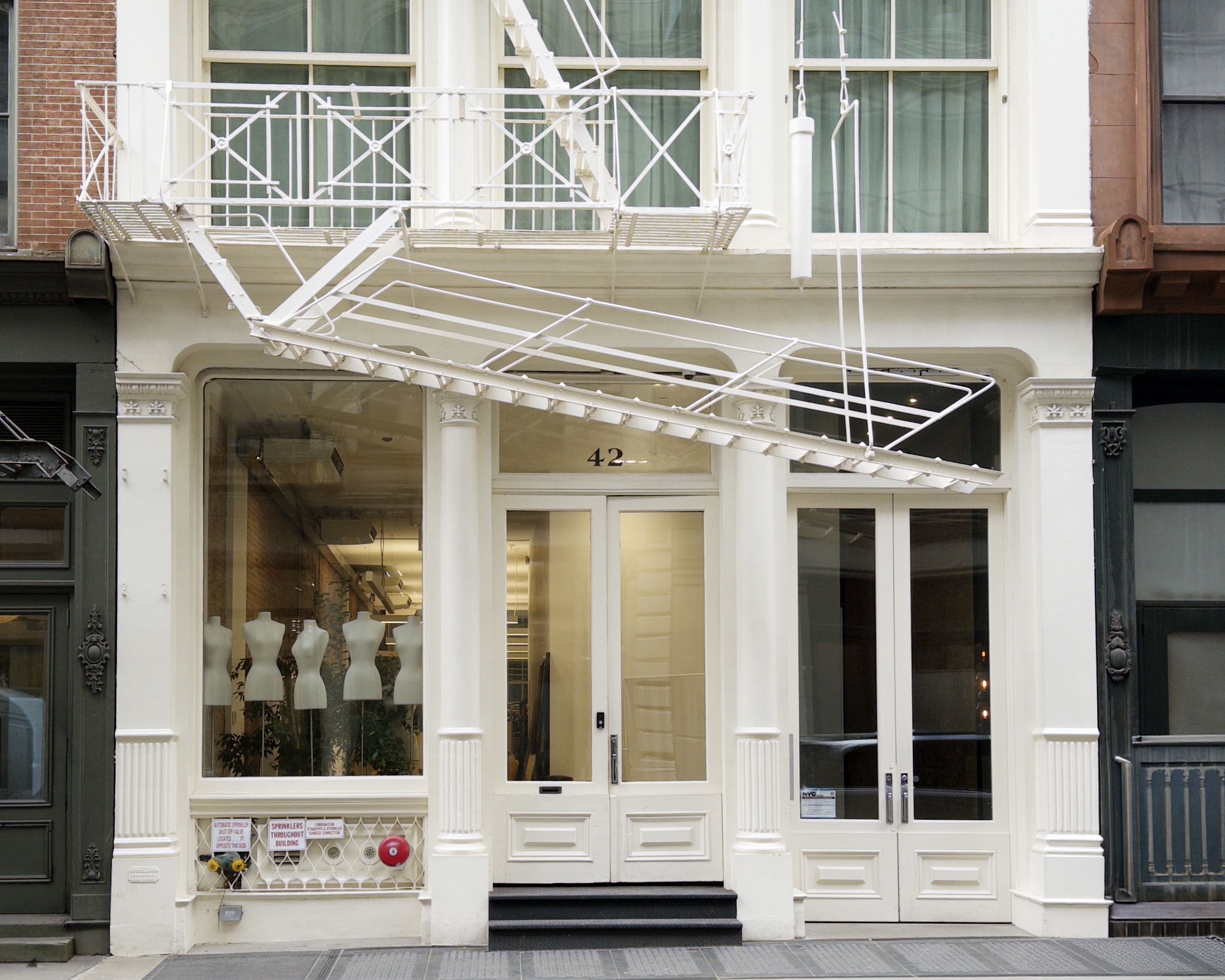 Storefront of Zero + Maria Cornejo boutique located at 42 Walker Street, New York City