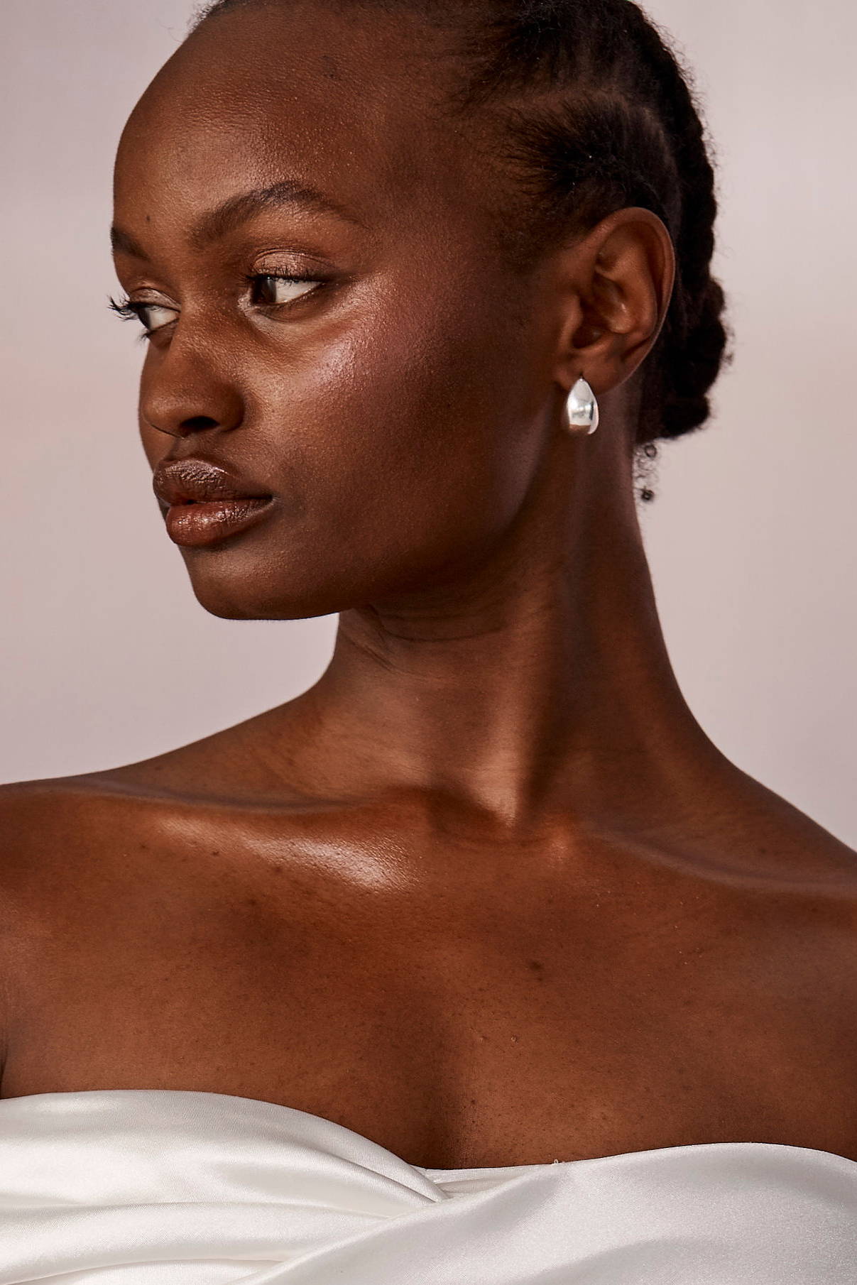 Close up of Campaign Model in Slicked Bun
