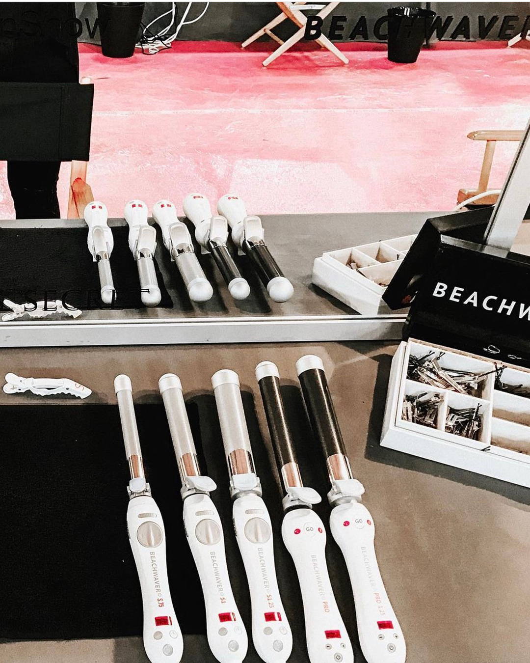 Image of Beachwaver Tools lined up backstage 