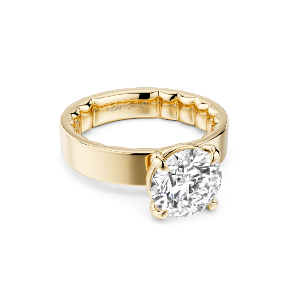 Gold ring with a large, sparkling diamond.