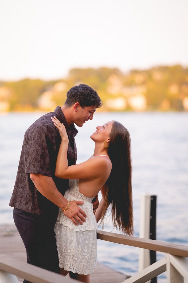 engaged couple embracing, candlewood lake, ct