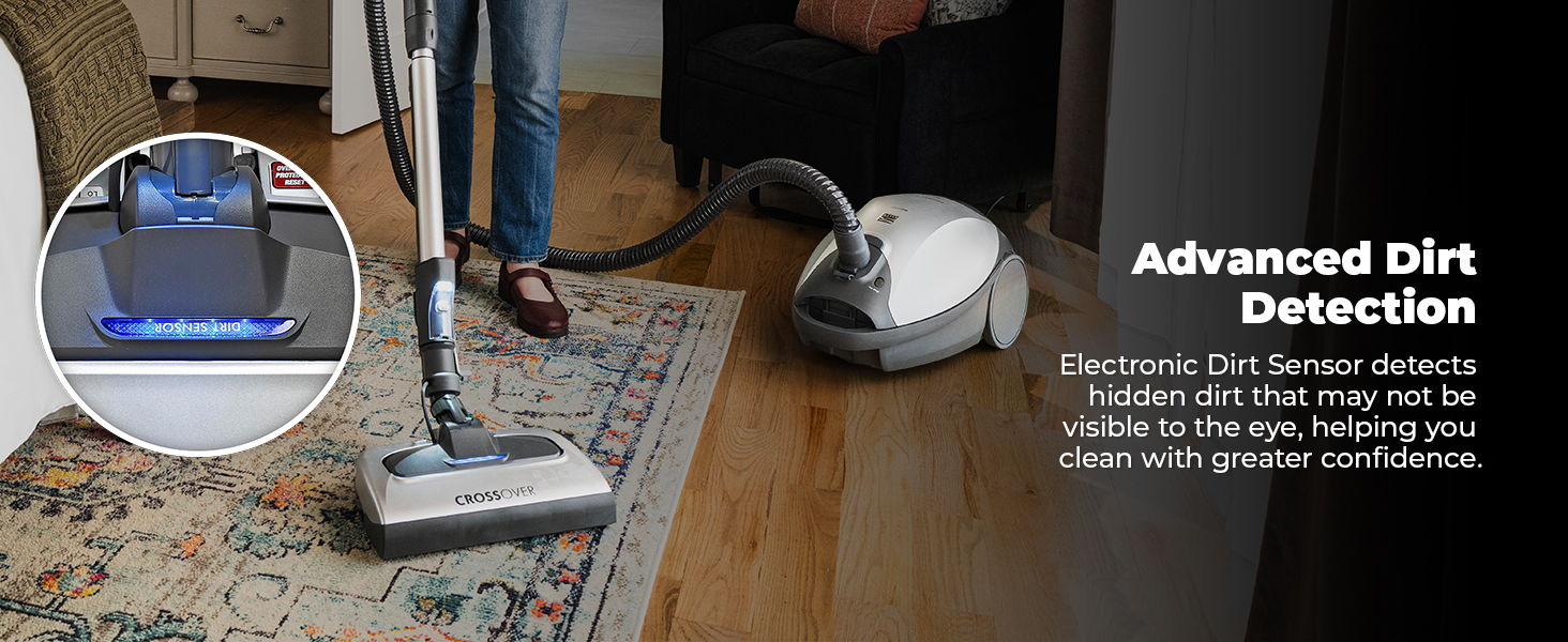 Vacuum cleaner demonstrating advanced dirt detection on a rug.